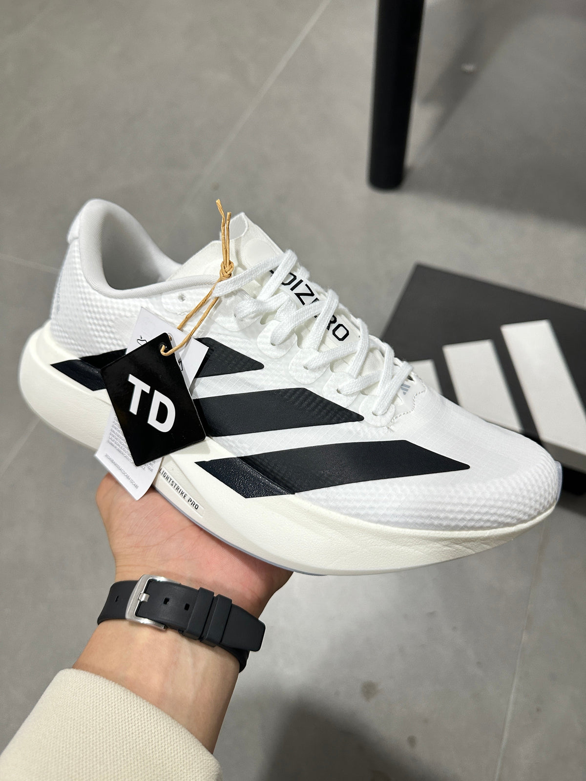 adidas Adizero Lightstrike Pro Running Shoes in White JR4736 - product image from the listing.