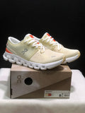 Cream and Orange On Cloud X 4 Sneakers - product image from the listing.