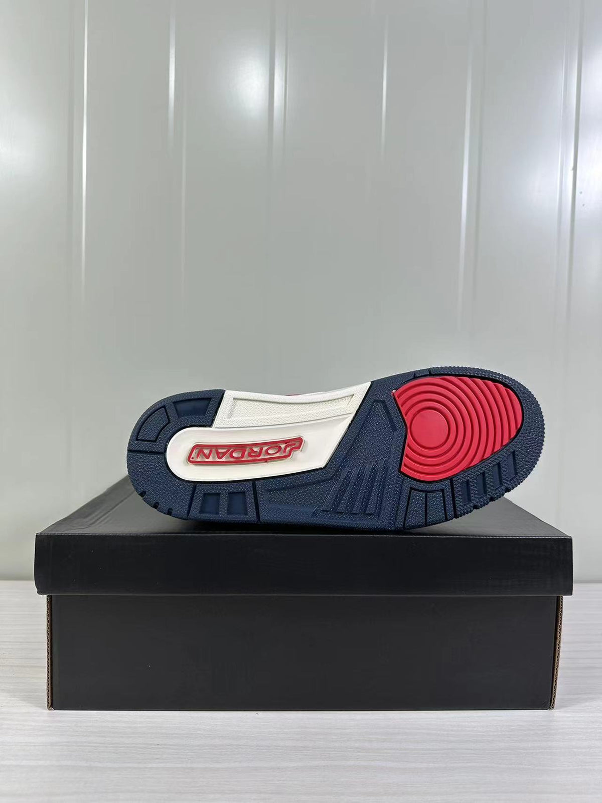 Jordan Legacy 312 Low in White Blue Red HM3709-141 - product image from the listing.