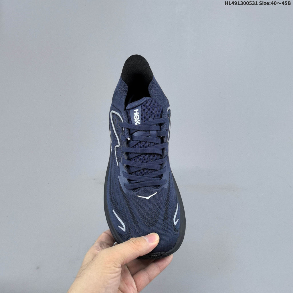 Navy and Black HOKA Clifton 10 Running Shoes - product image from the listing.