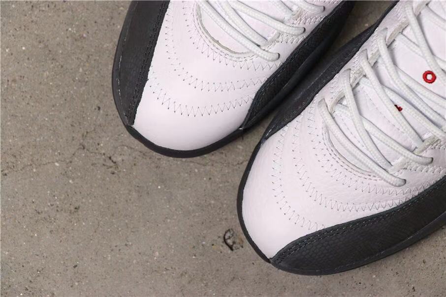 Air Jordan 12 Retro Dark Grey Sneakers in White Black - product image from the listing.