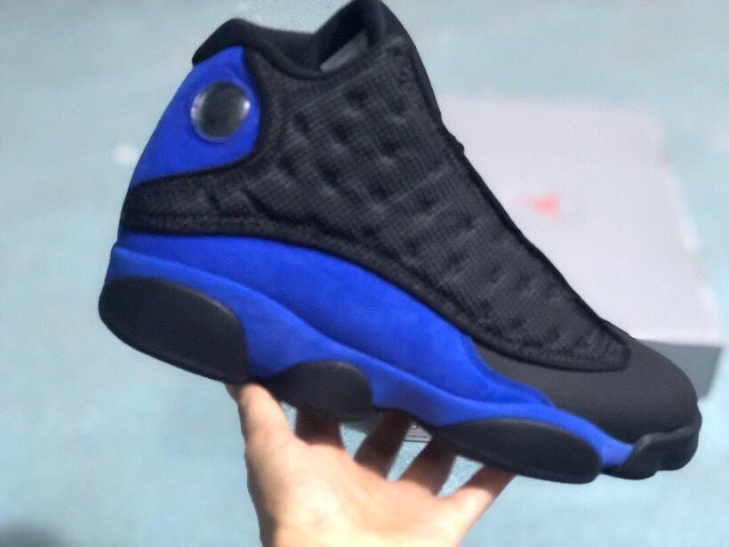 Jordan 13 Retro Sneakers Black/Royal in Blue - product image from the listing.