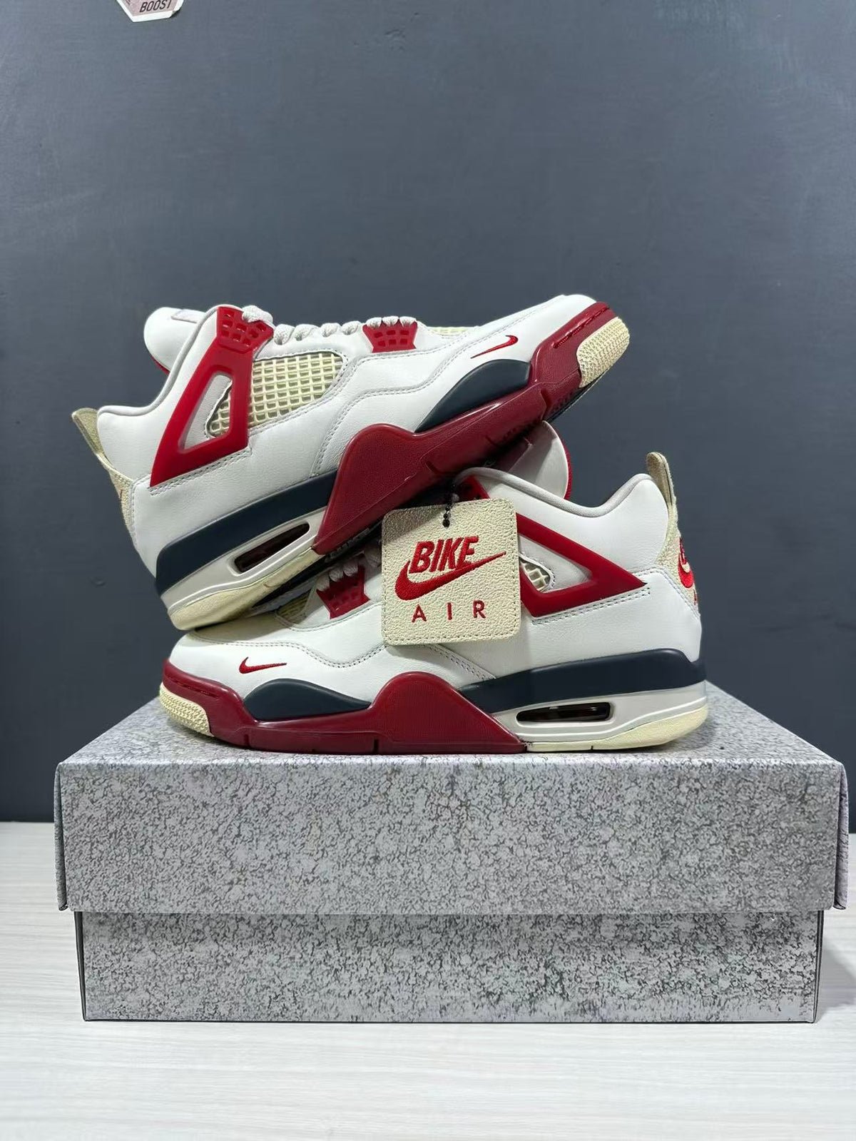 Air Jordan 4 Retro White Red Sneakers - product image from the listing.