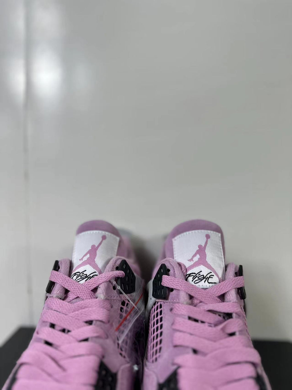 Air Jordan 4 Retro Orchid Pink Sneakers AQ9129-501 - product image from the listing.