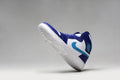 Jordan 1 Retro High Sneakers in White Blue - product image from the listing.