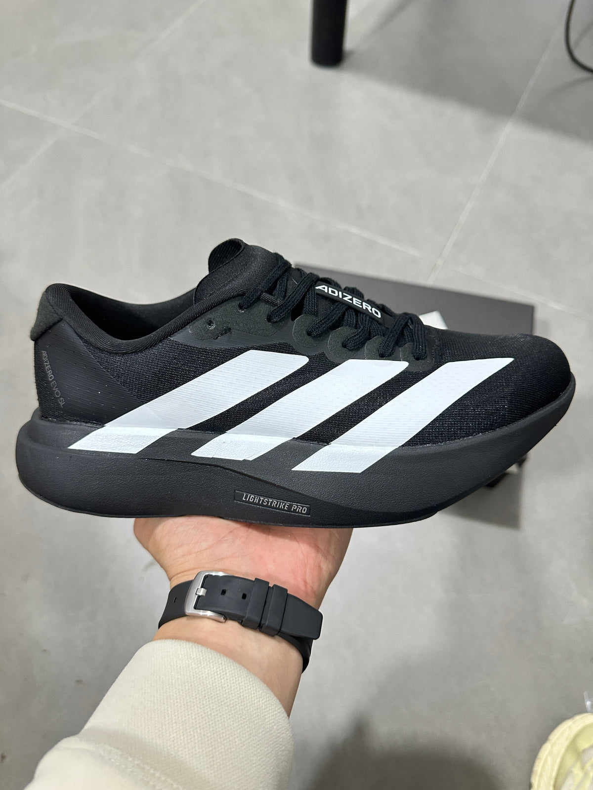 Adidas Adizero Lightstrike Pro Running Shoes in Black White - product image from the listing.