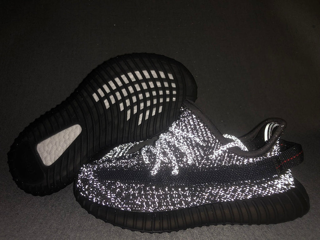 Black Yeezy 350 V2 Kids Sneakers - product image from the listing.