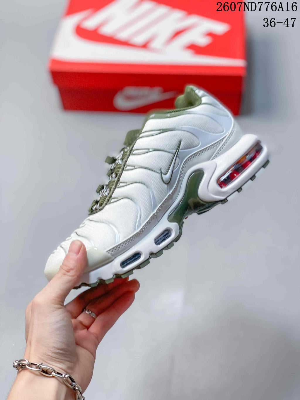Nike Air Max Plus Sneakers in White and Green 2607ND776A16 - product image from the listing.