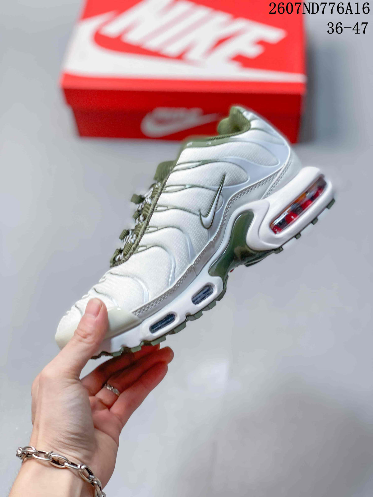 Nike Air Max Plus Sneakers in White and Green 2607ND776A16 - product image from the listing.