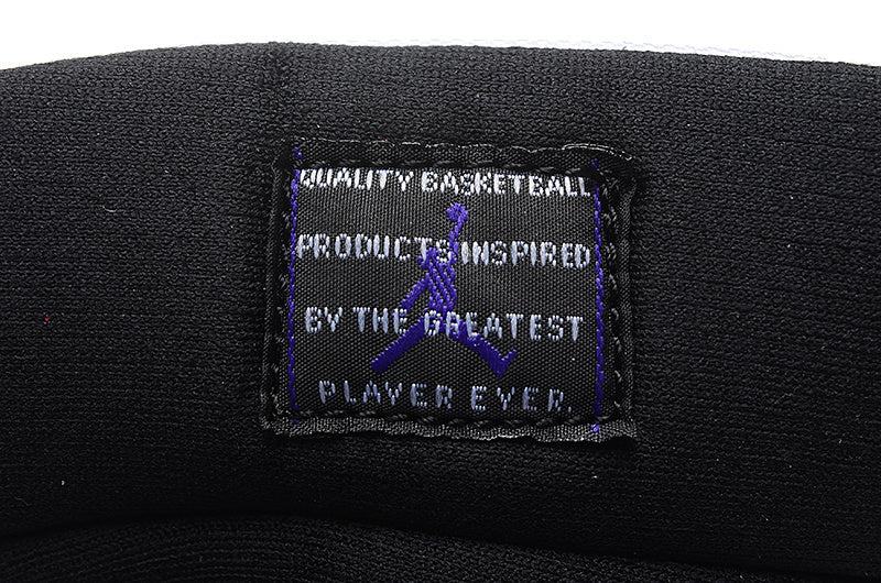 Air Jordan 11 Low Basketball Sneakers in White Black - product image from the listing.