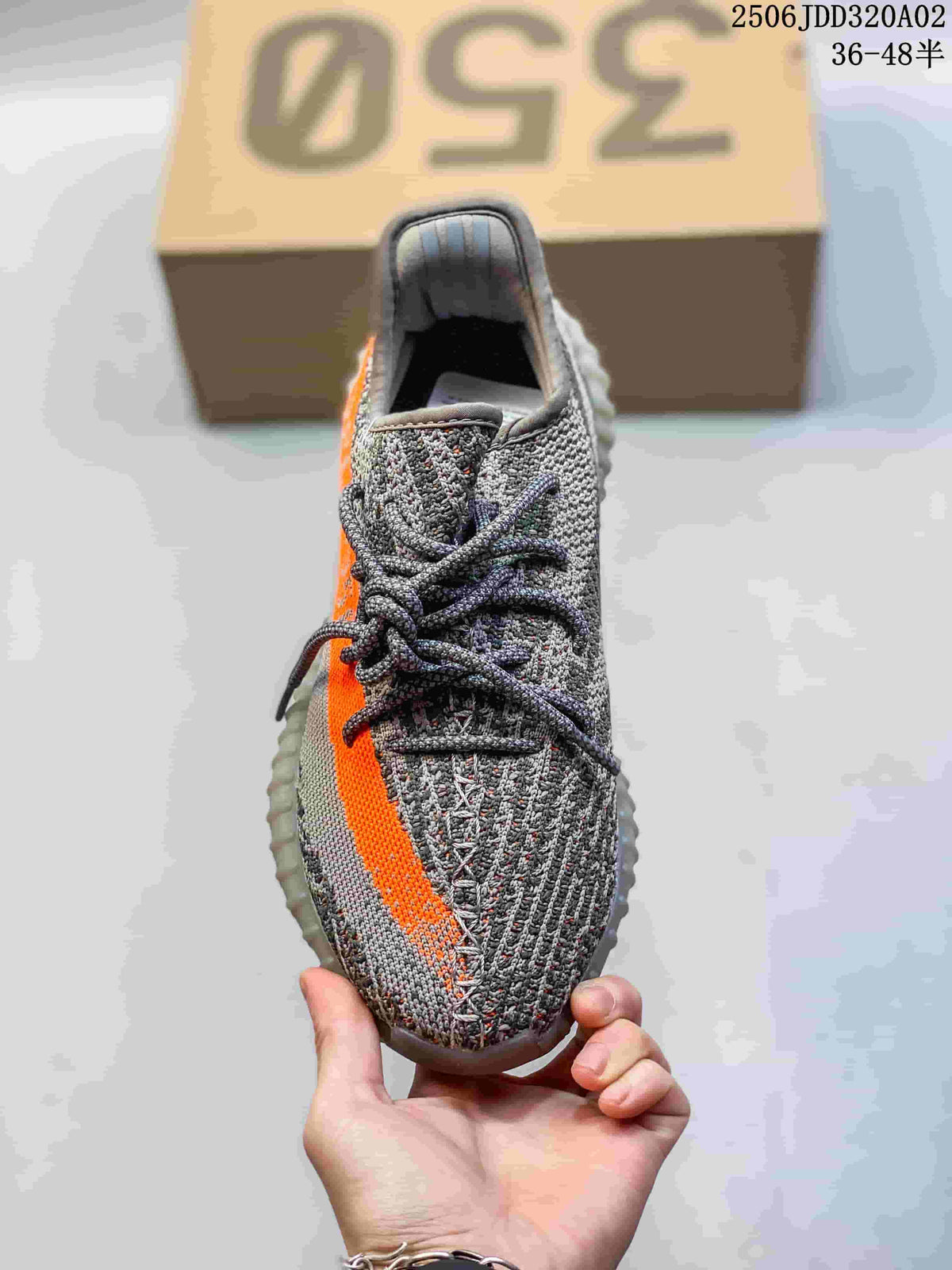 adidas Yeezy Boost 350 Sneakers in Gray Orange - product image from the listing.