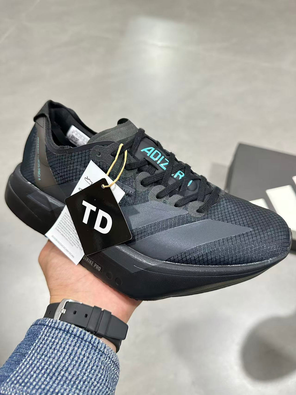 Nike Lightstrike Pro Running Shoes in Black Gray HQ7411 - product image from the listing.