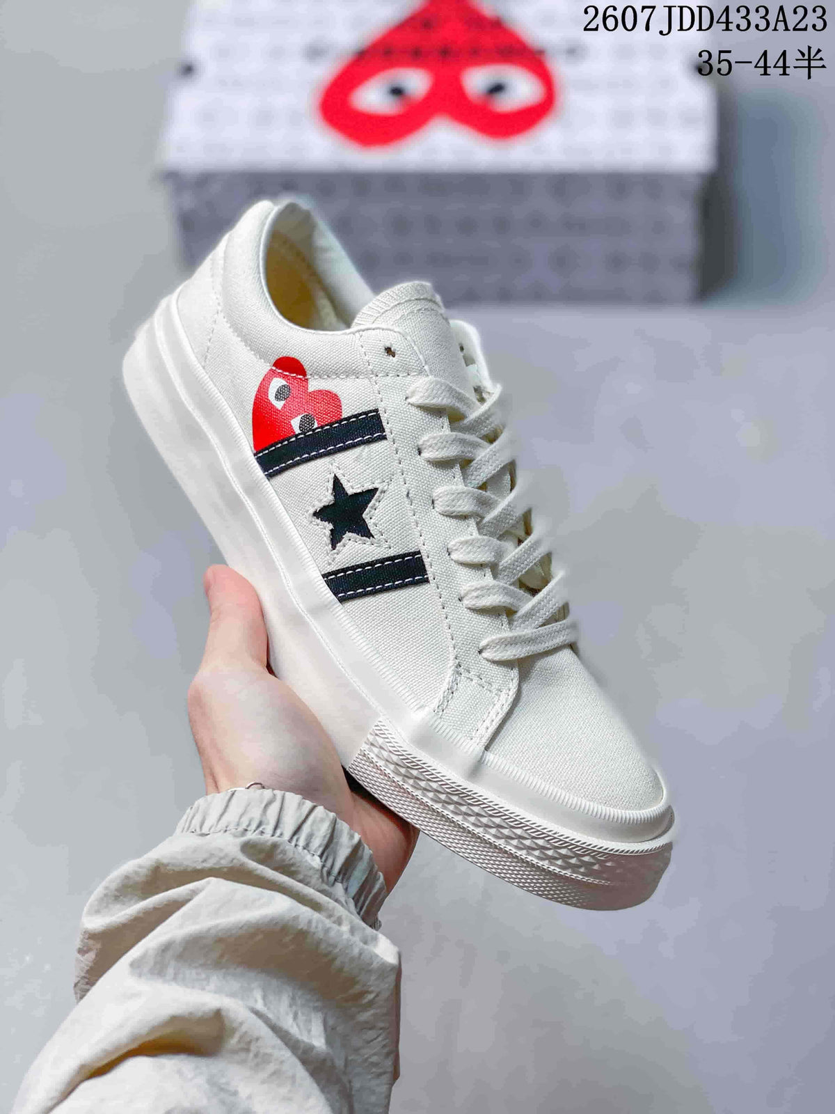CDG Play x Converse One Star Academy Pro Sneakers in Navy White - product image from the listing.