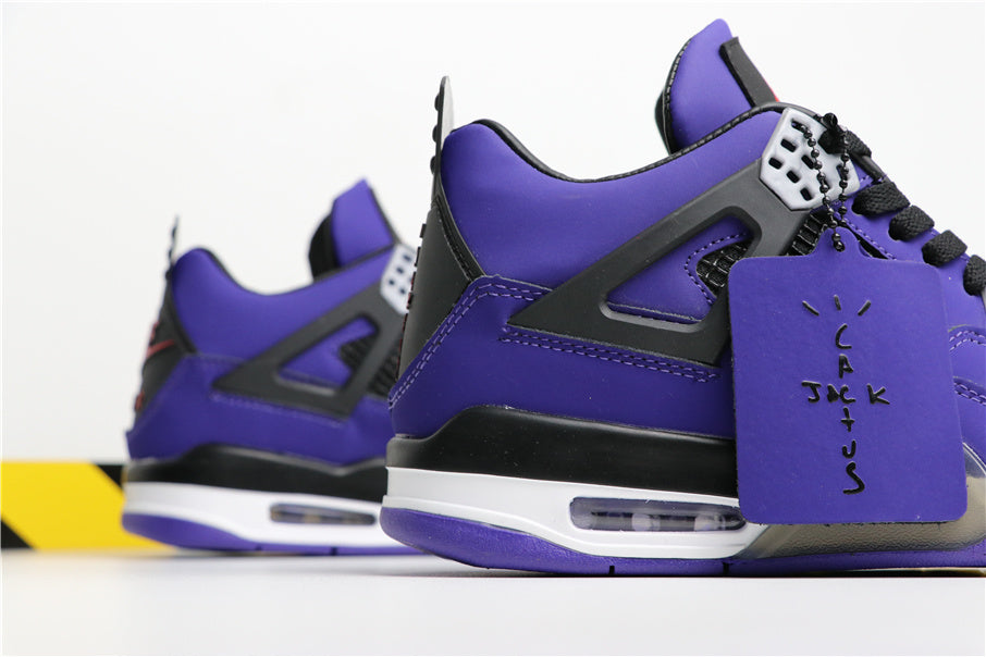Jordan 4 Retro Sneakers in Purple Suede 308497-406 - product image from the listing.