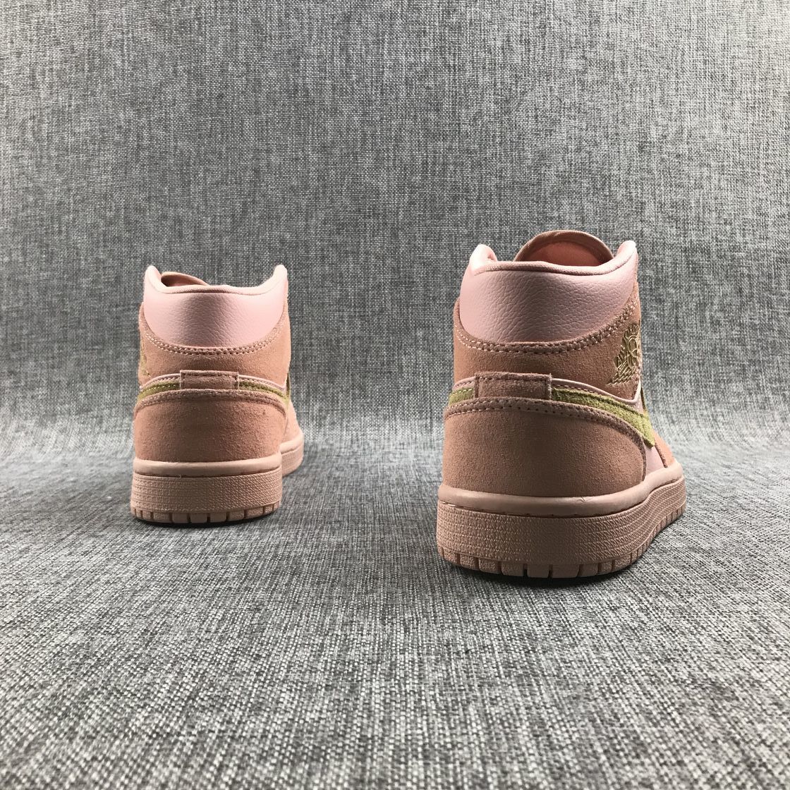 Jordan 1 Mid SE Sneakers in Pink 852542-600 - product image from the listing.