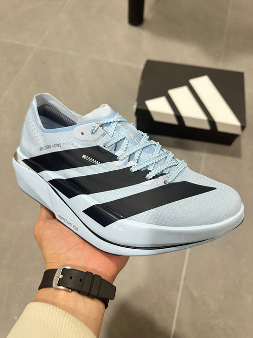 adidas Adizero Adios Pro Running Shoes, in Light Blue and Black - product image from the listing.