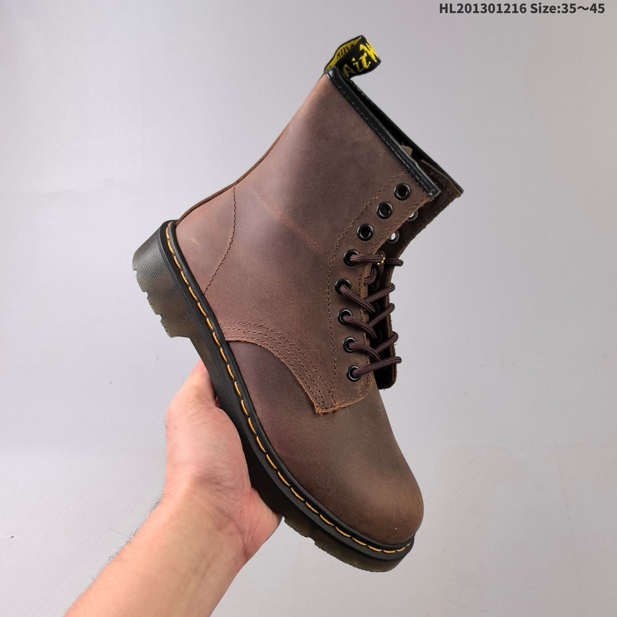 1460 Brown Platform Lace-Up Boots by Dr. Martens - product image from the listing.