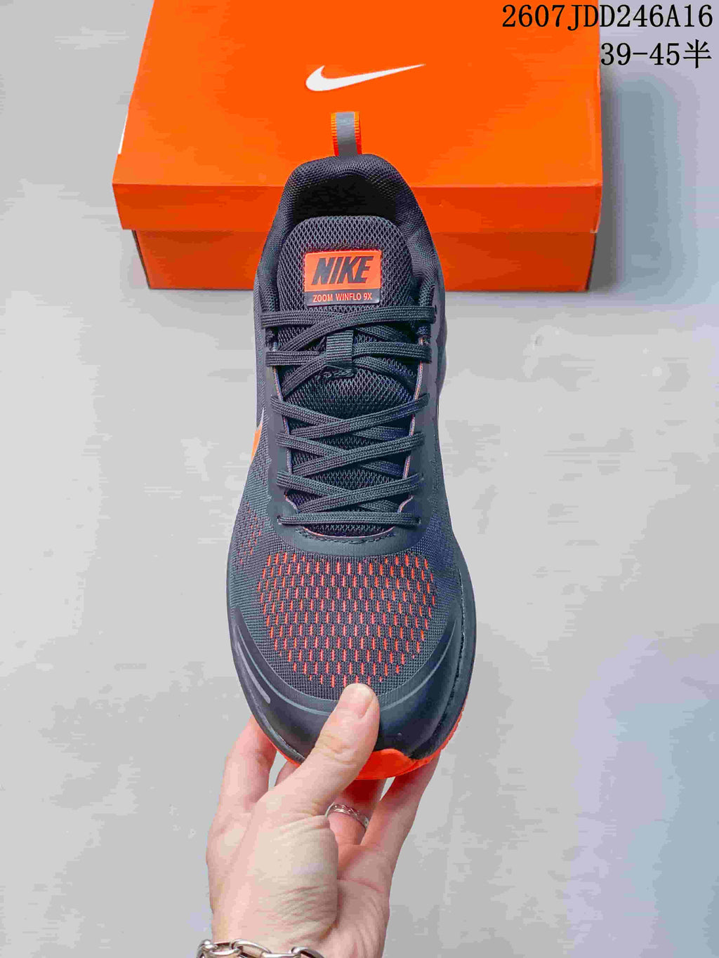Nike Zoom Winflo 9X Running Sneakers in Dark Gray Orange CZ6720-001 - product image from the listing.