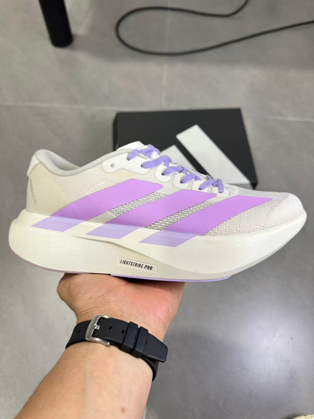 adidas Lightstrike Pro Running Shoes in White Purple KI7354 - product image from the listing.