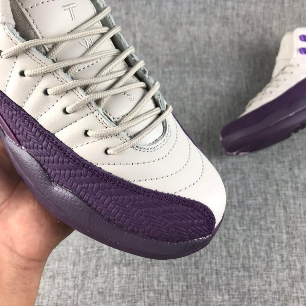 Air Jordan 12 White Purple Sneakers 510815-001 - product image from the listing.