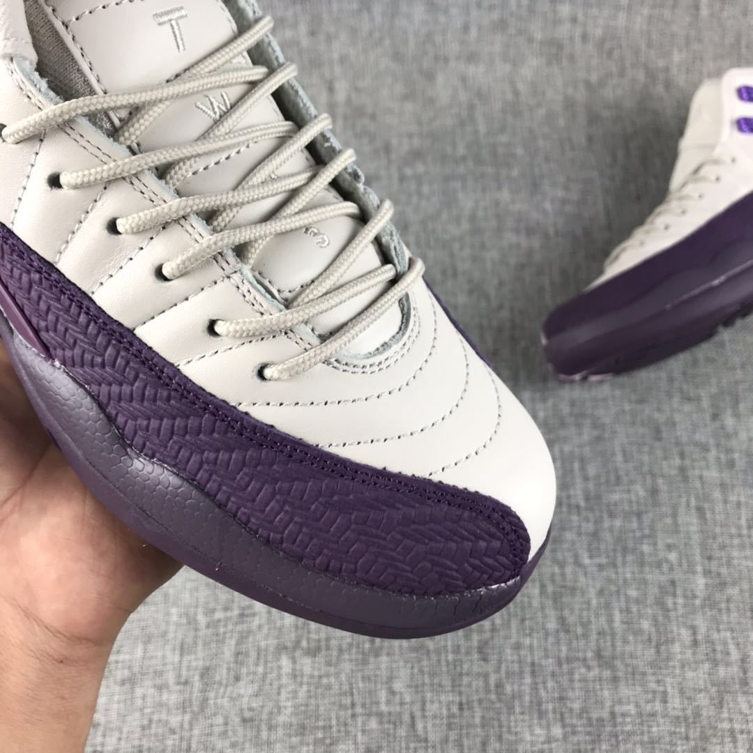 Air Jordan 12 White Purple Sneakers 510815-001 - product image from the listing.