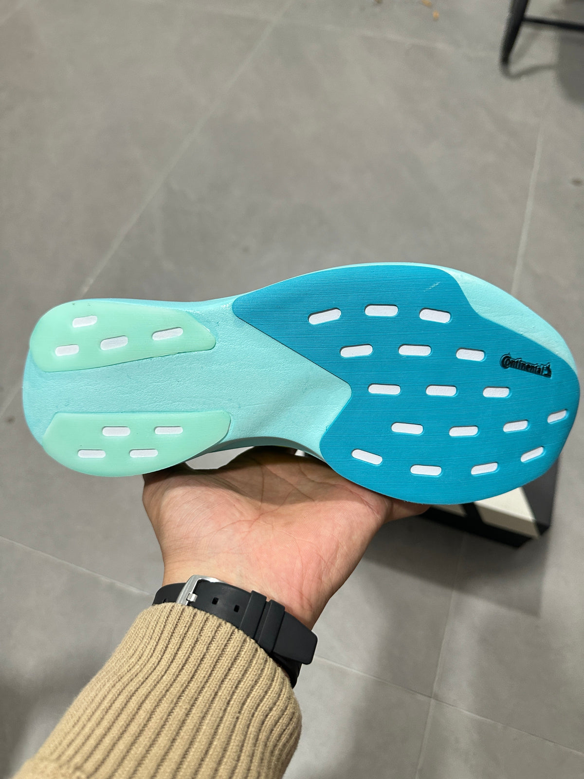 Adidas Lightstrike Pro Running Shoes, in Turquoise and Volt - product image from the listing.