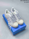 adidas Superstar White and Lavender Shell-Toe Trainers - product image from the listing.