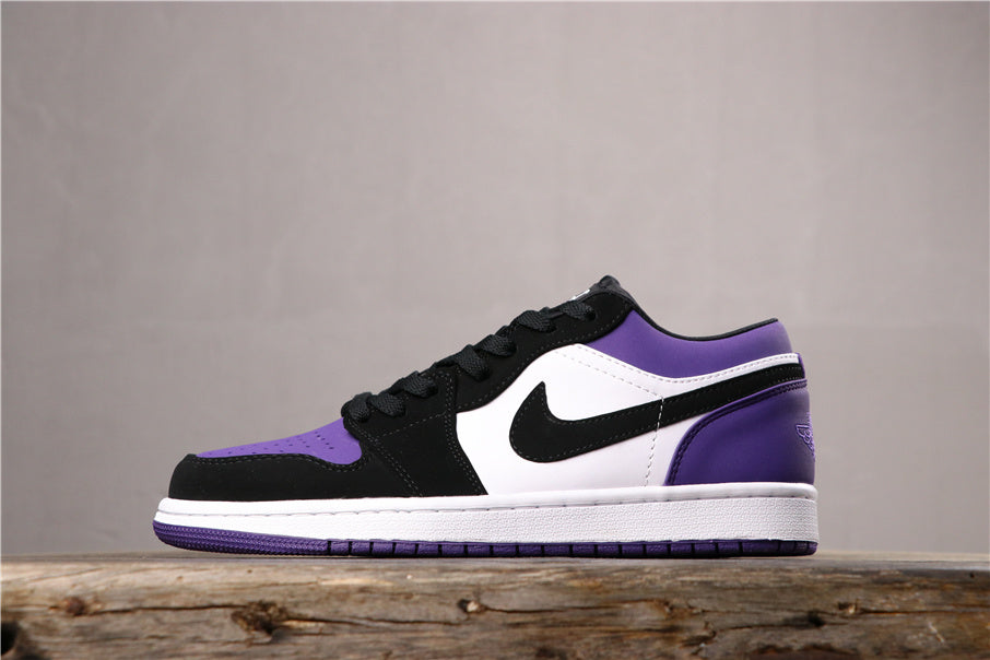 Air Jordan 1 Low Sneakers in White Black Orange Purple 553558-125 - product image from the listing.