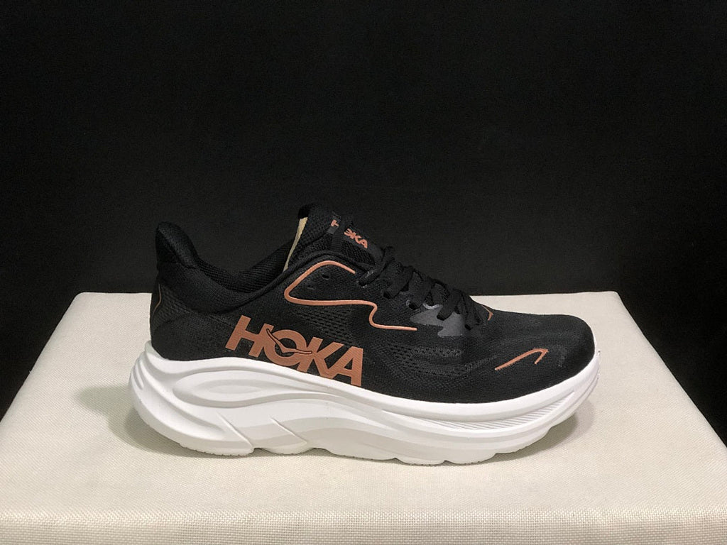 HOKA Clifton 10 Running Shoes, in Black and White - product image from the listing.