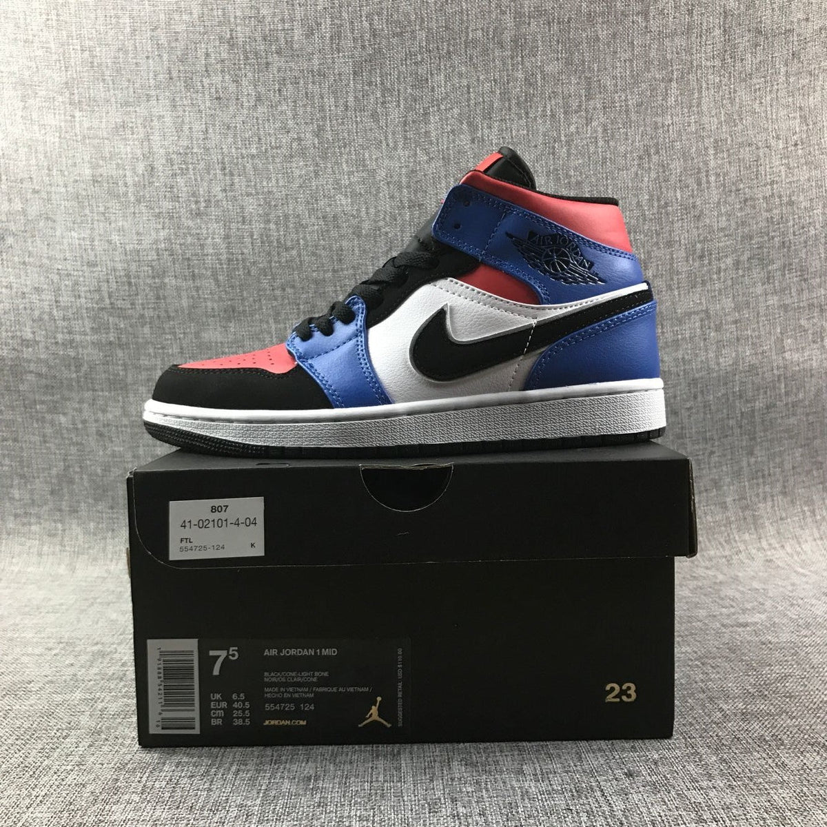 Air Jordan 1 Mid Sneakers in Blue Red Black White - product image from the listing.
