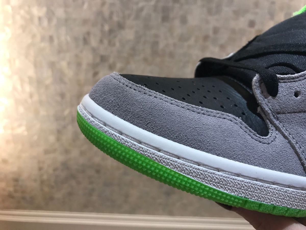 Jordan 1 Retro High OG High-Top Sneakers in Grey Green - product image from the listing.