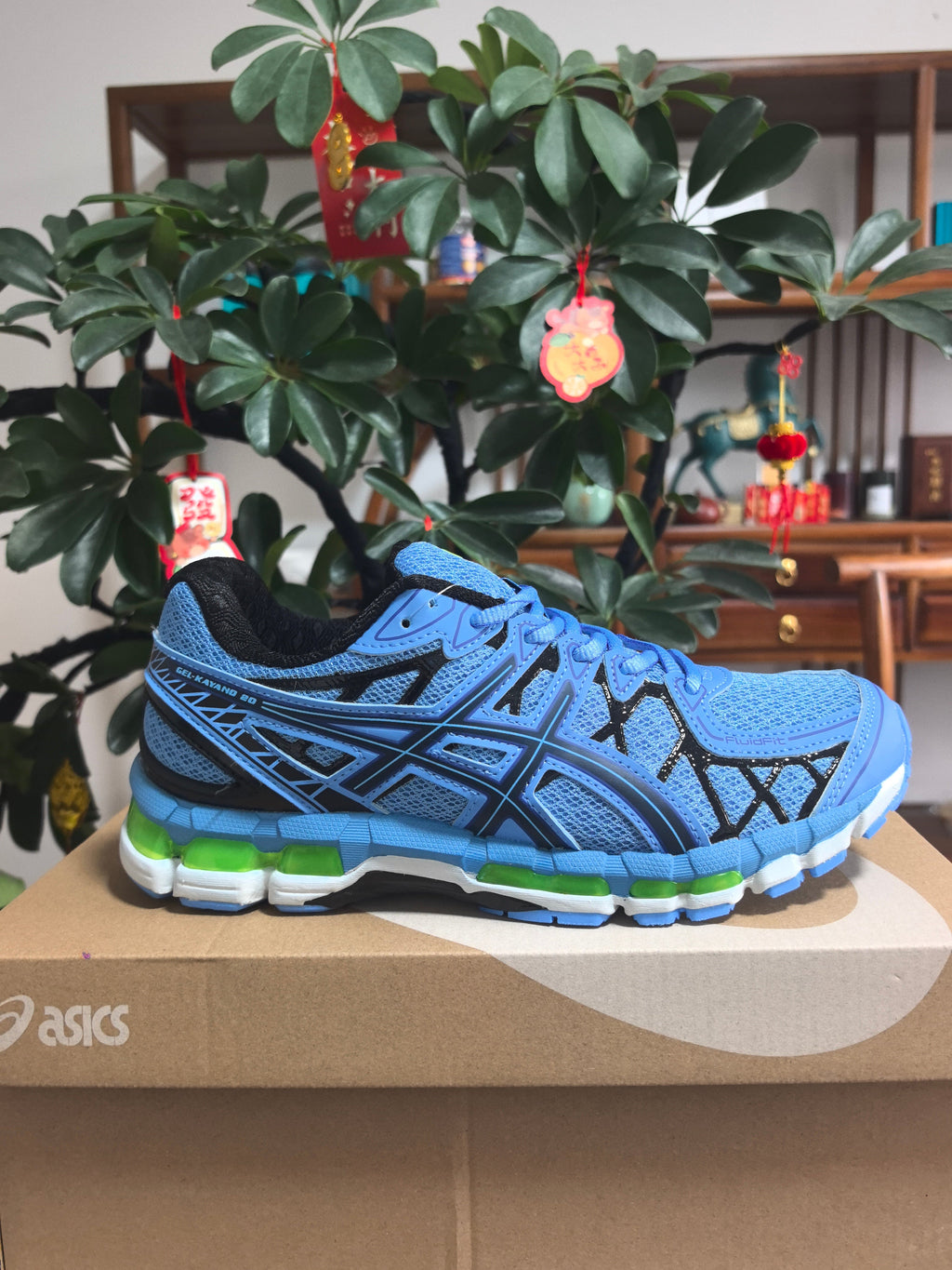 ASICS GEL-KAYANO 14 Sneakers in Blue and Black - product image from the listing.