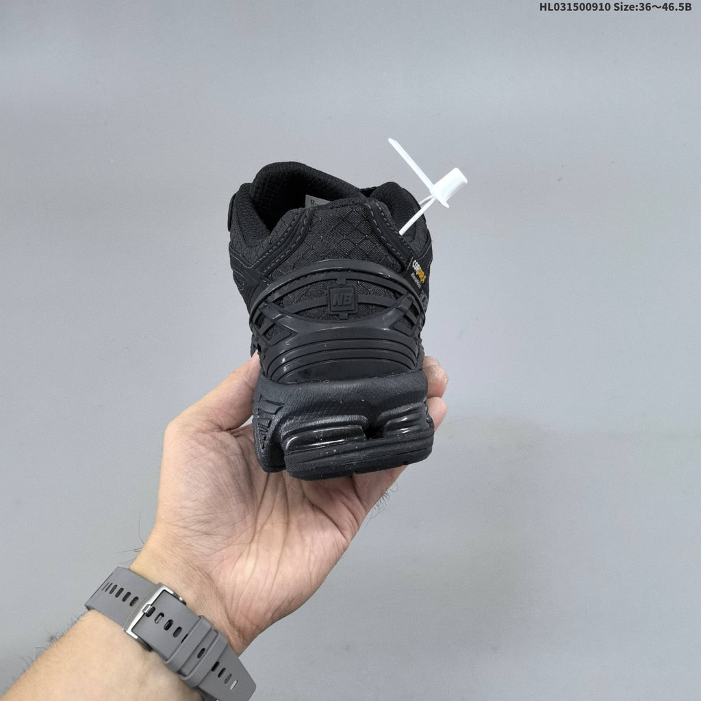 New Balance 1906R Sneakers in Black HL031500910 - product image from the listing.