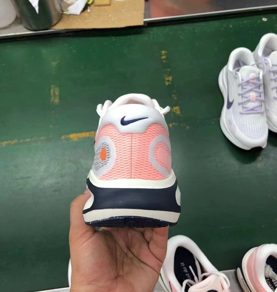 Nike Journey Run Road Running Shoes in White Coral FN0228-100 - product image from the listing.