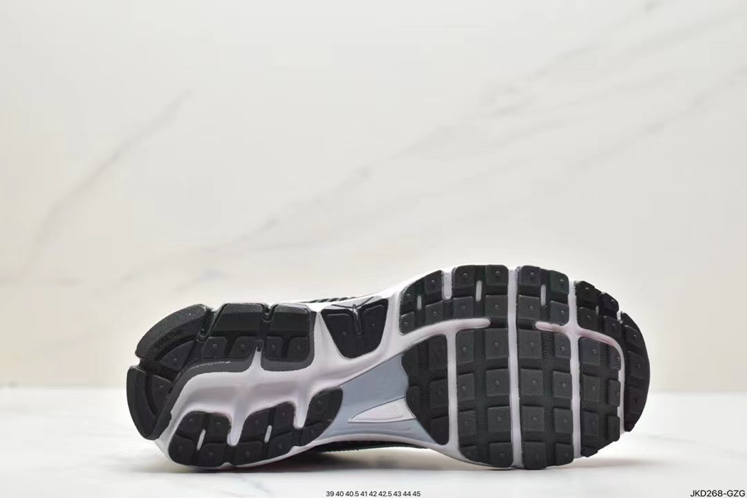 Nike Air More Uptempo Sneakers in Black and White - product image from the listing.