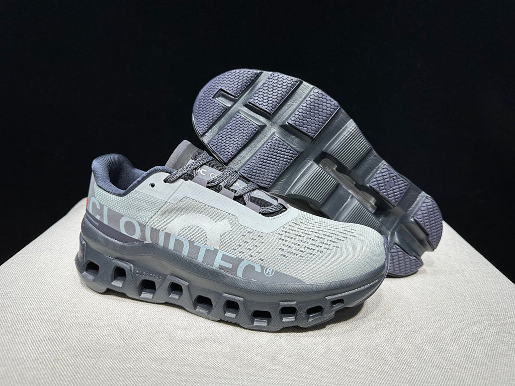 On Cloudmonster Shoes for Running in Eclipse and Magnet - product image from the listing.
