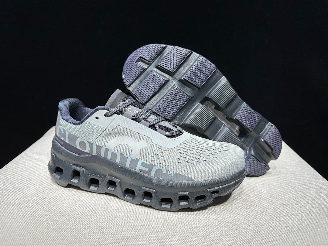 On Cloudmonster Shoes for Running in Eclipse and Magnet - product image from the listing.