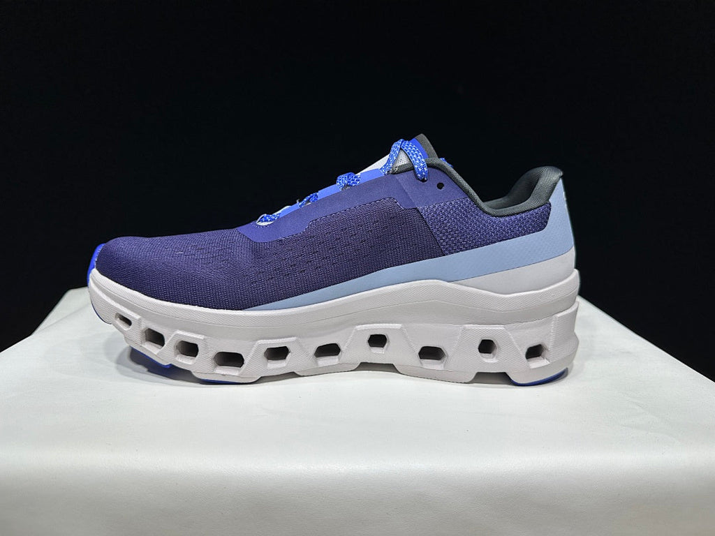 On Cloudmonster Running Shoes, in Navy and White - product image from the listing.