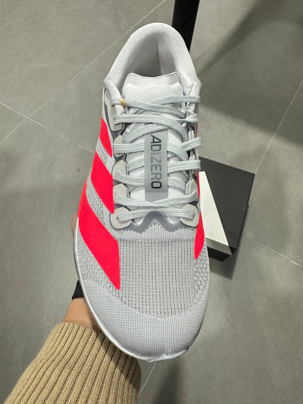 Adidas Lightstrike Pro Running Shoes, in Gray and Red KI3381 - product image from the listing.