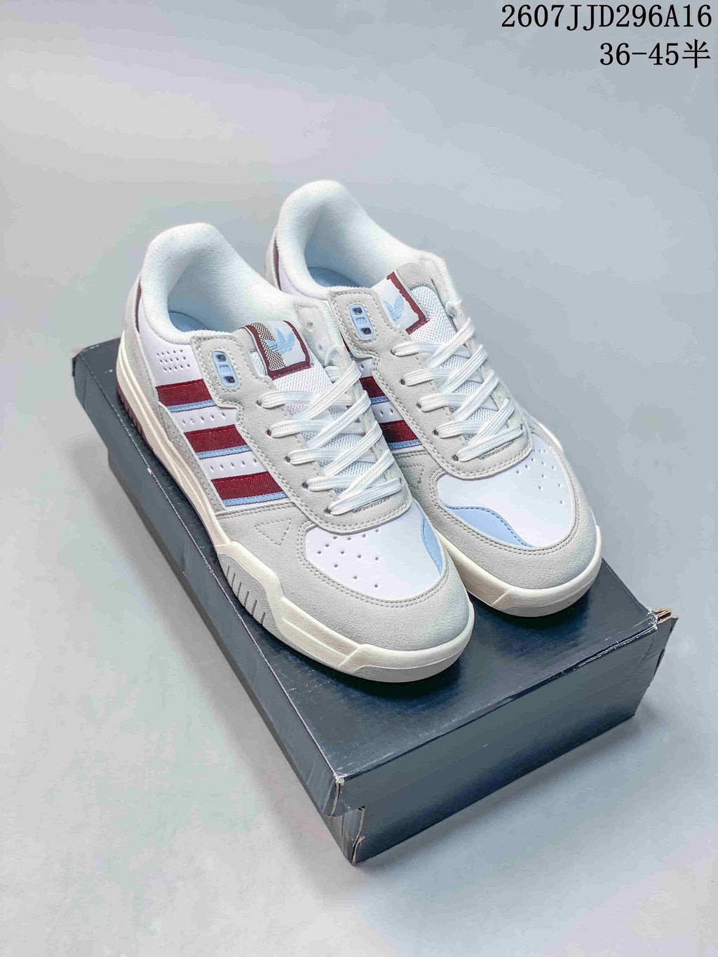 adidas Originals Tekkira Cup Sneakers in White Red Blue 07JJD296A16 - product image from the listing.