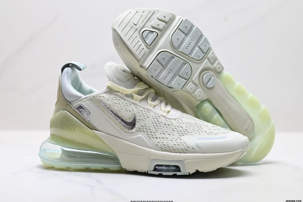 Light Green and White Nike Air Zoom Sneakers - product image from the listing.