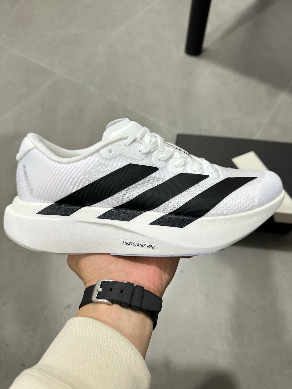 adidas Lightstrike Pro Running Shoes in White Black JH6206 - product image from the listing.
