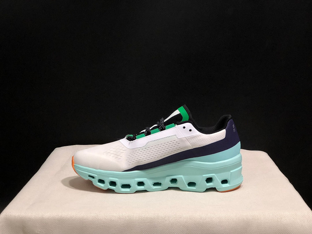 White and Aqua On Cloudmonster Running Shoes - product image from the listing.