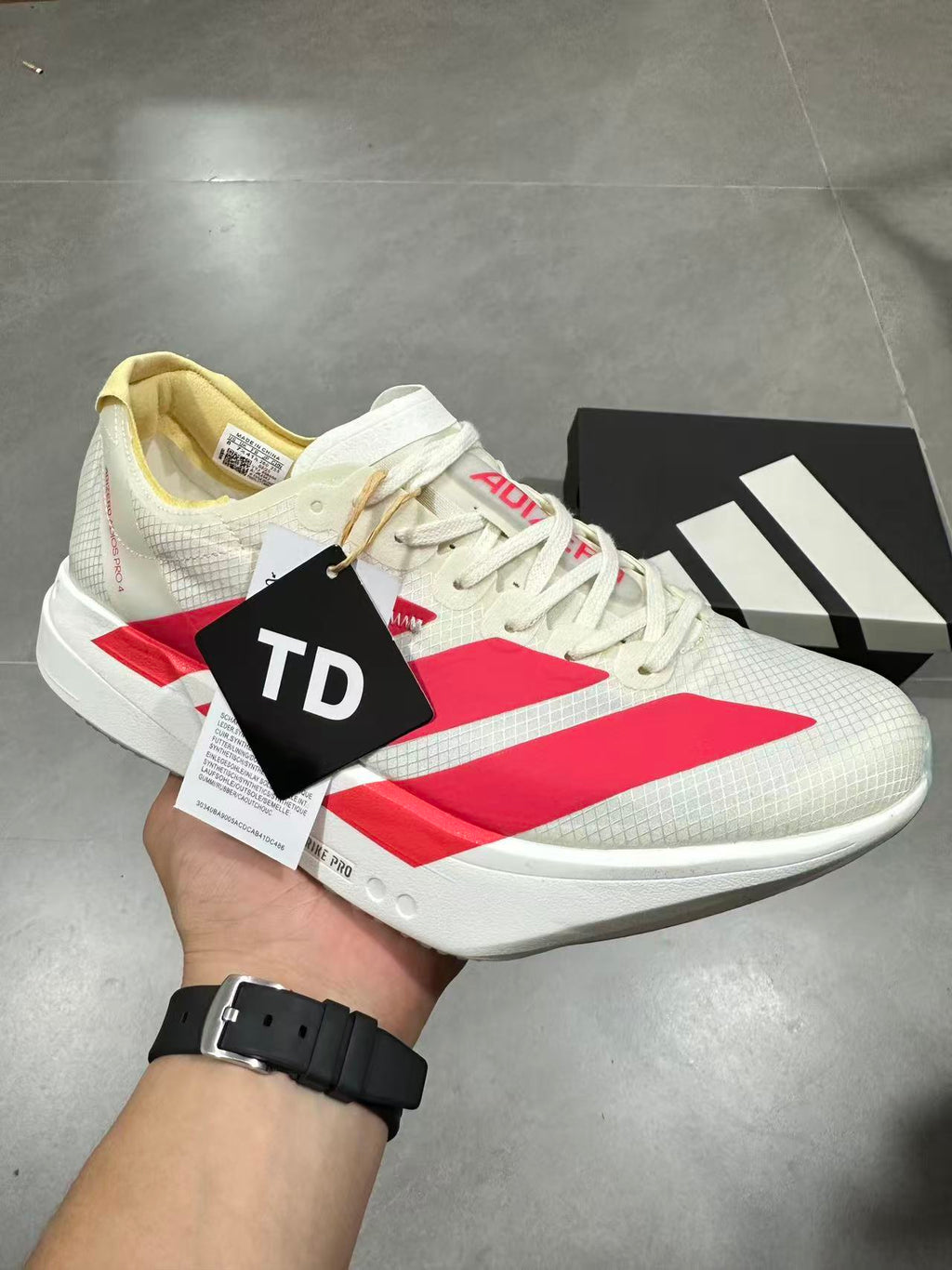 adidas Lightstrike Pro Running Shoes in White Red JR4542 - product image from the listing.