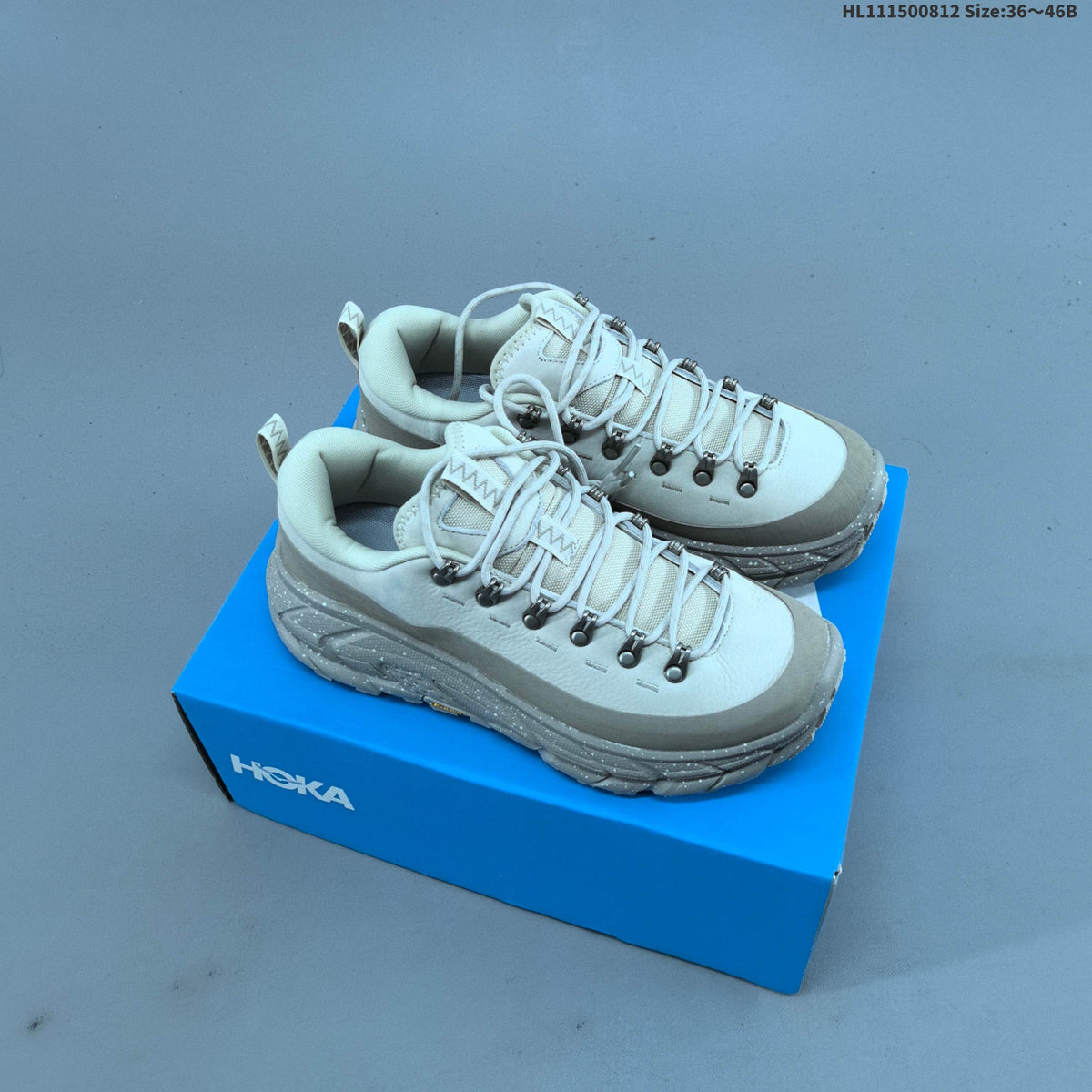 HOKA Tor Low-Top Sneakers in Summit - product image from the listing.