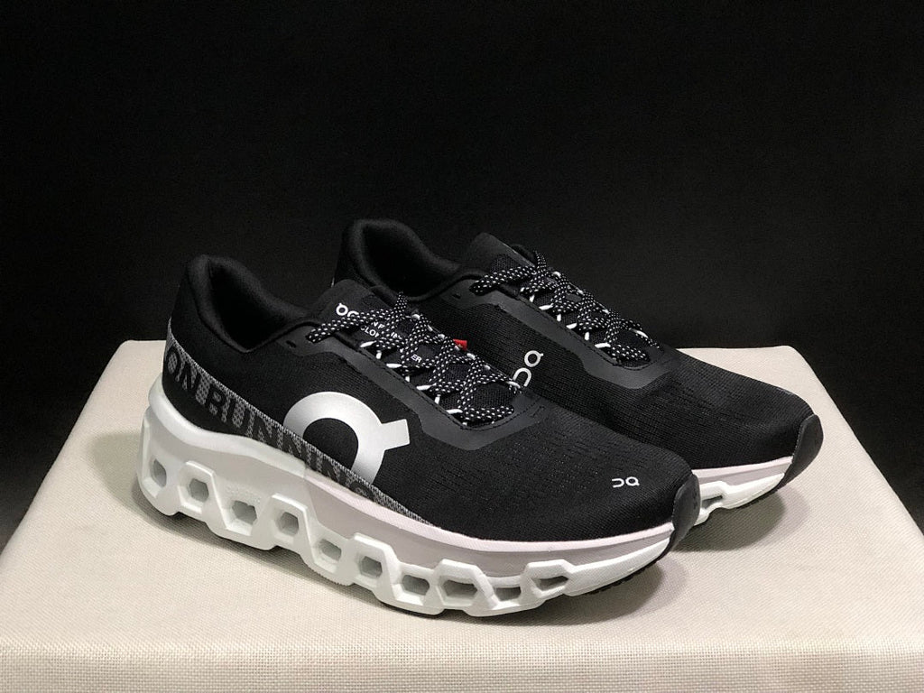 On Cloudmonster 2 Running Shoes in Black White - product image from the listing.