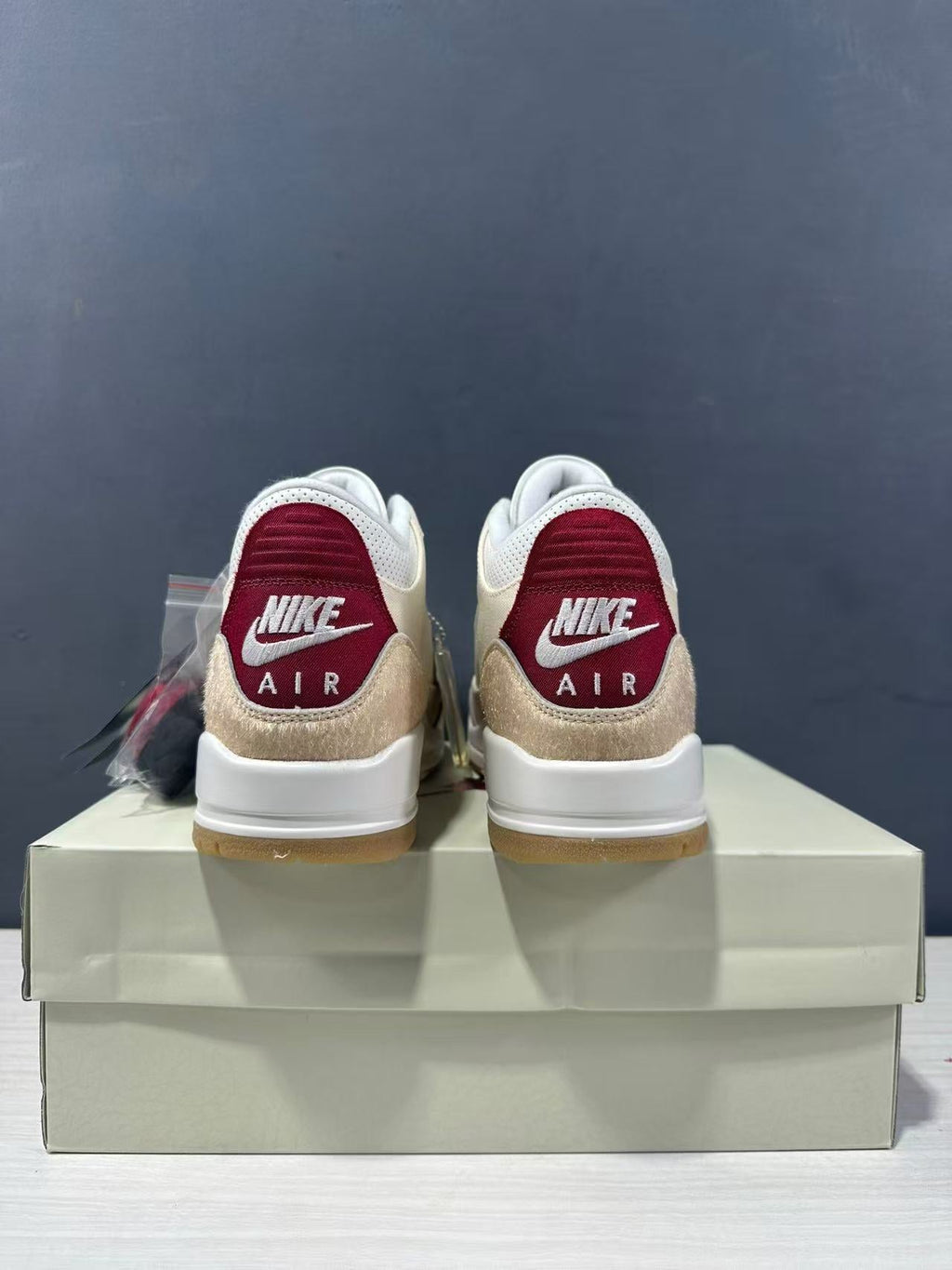 Air Jordan 3 Retro Jumpman Year of the Horse Sneakers Cream Red IR0910-400 - product image from the listing.
