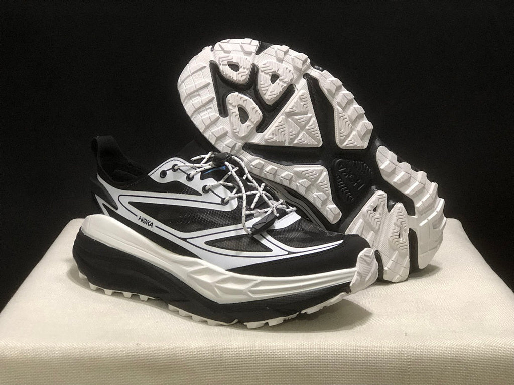 HOKA Stinson One 7 Black and White Trail Trainers - product image from the listing.