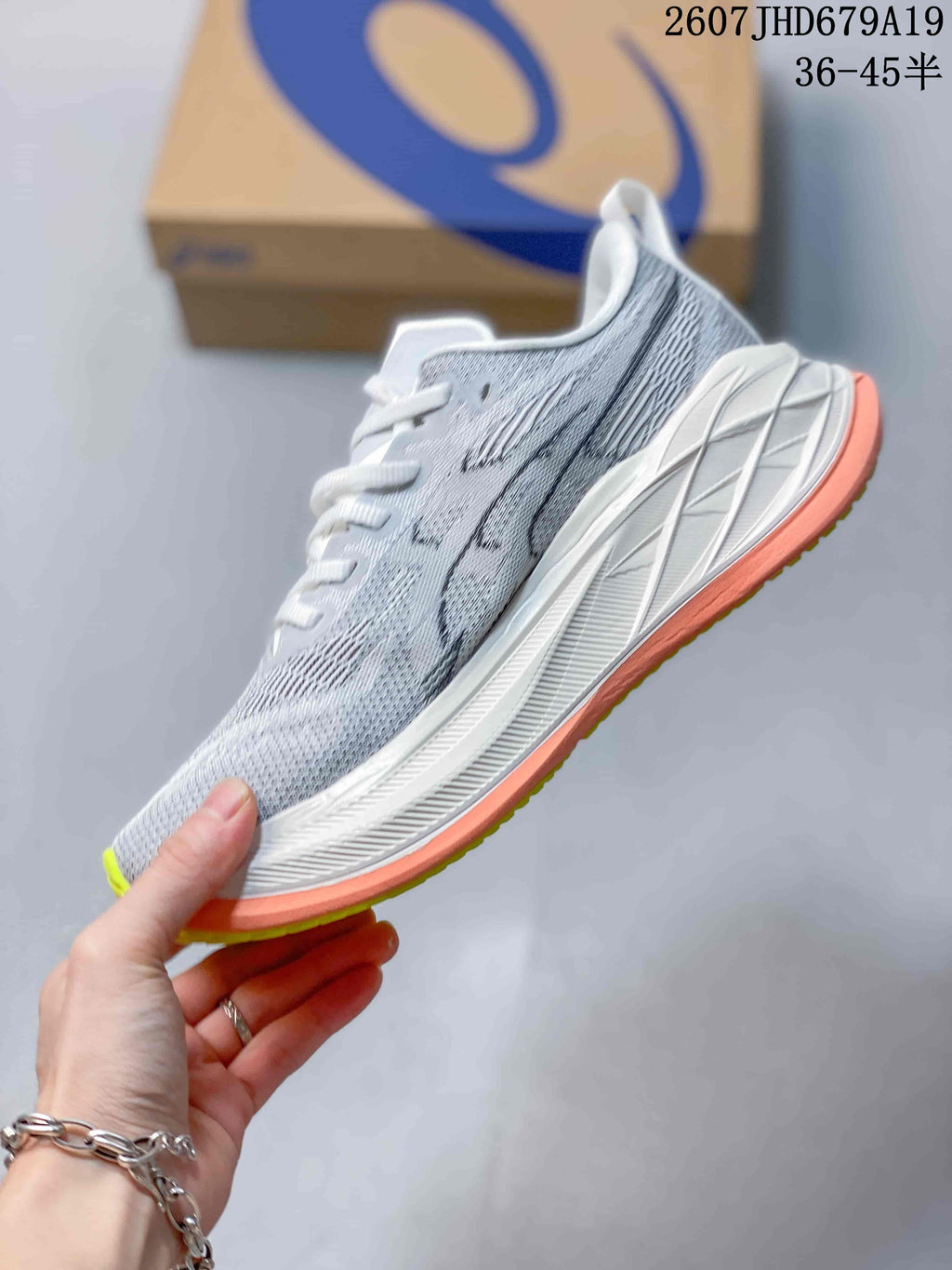 ASICS Superblast 2 Paris Running Shoes in Gray White Coral - product image from the listing.