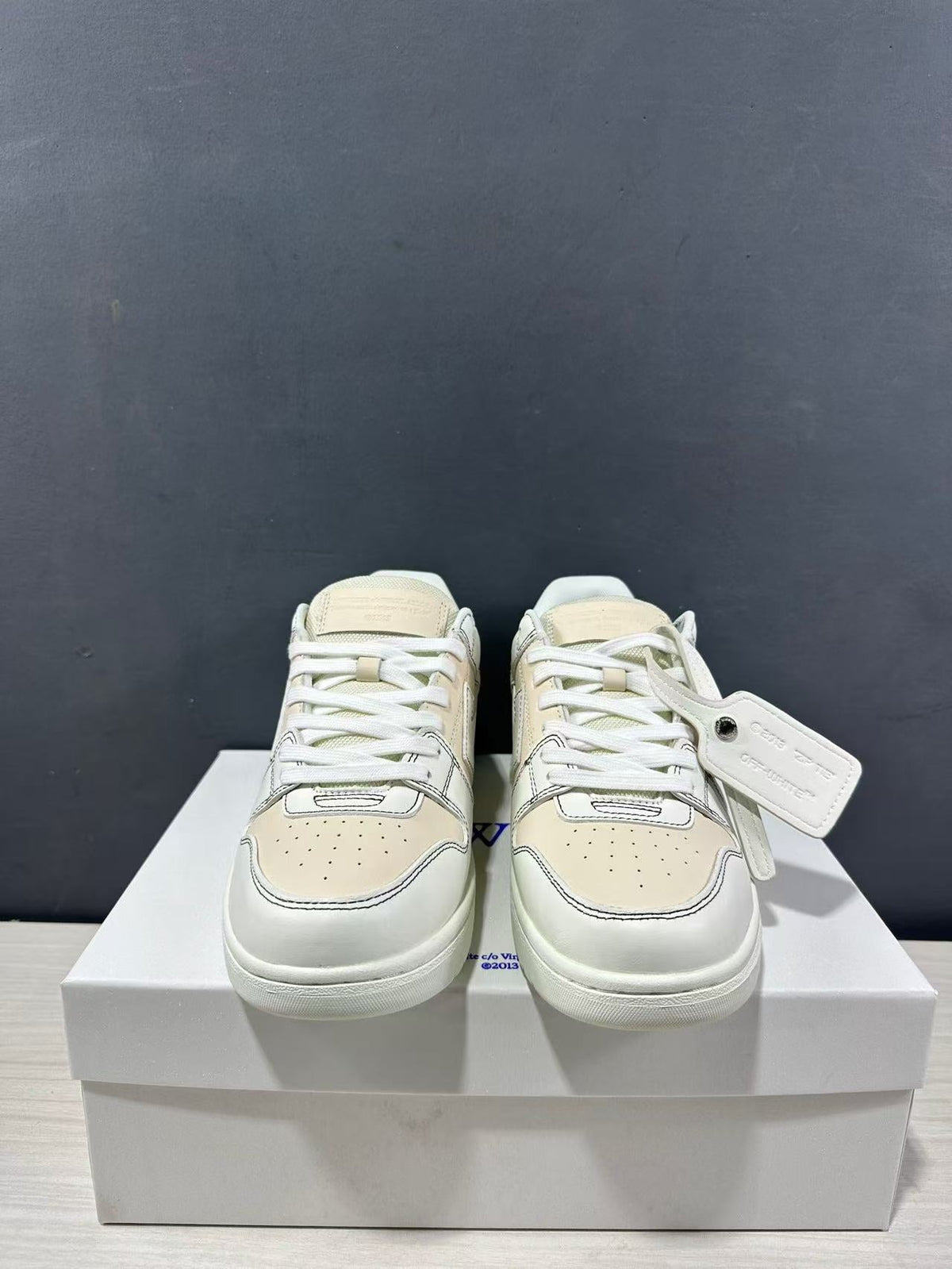 Off-White Off Court Leather Low-Top Sneakers in Cream White - product image from the listing.